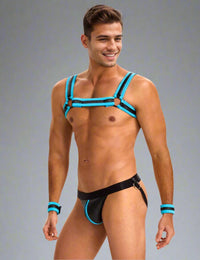 a man wearing a black and blue striped bikini