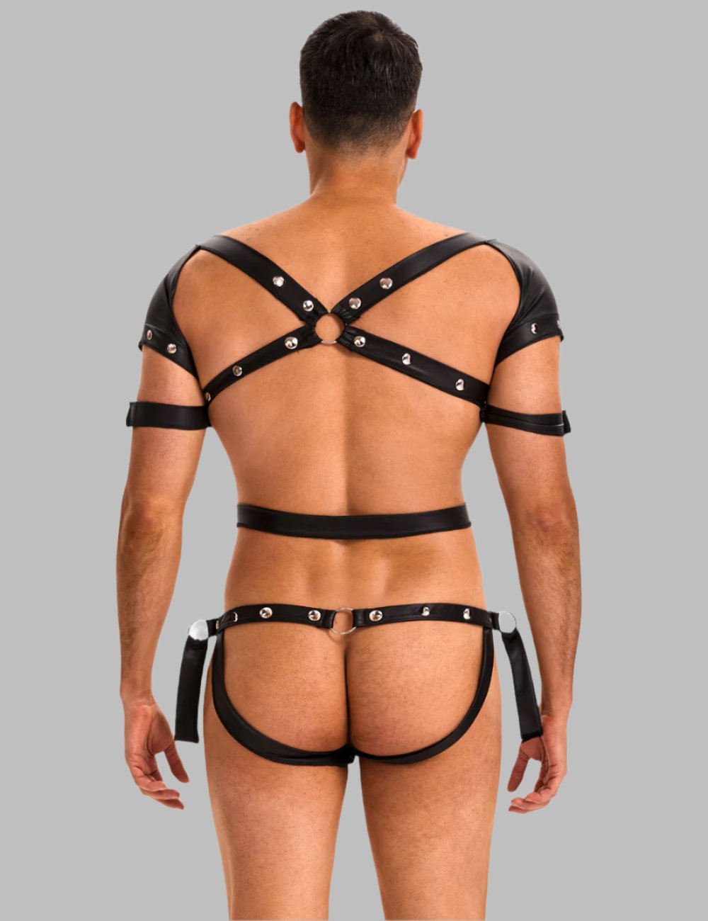 the back of a man wearing a black leather harness