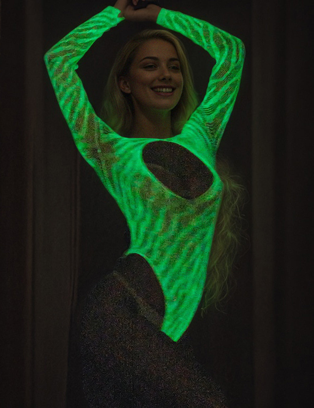 Stunning view of the White Sexy Open Chest Luminous Bodysuit, focusing on the unique glow-in-the-dark effect and premium quality materials.