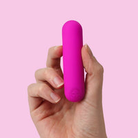 Thumbnail for a person holding a pink object in their hand