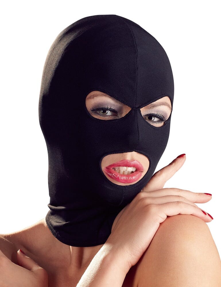 a woman wearing a black mask with red lipstick