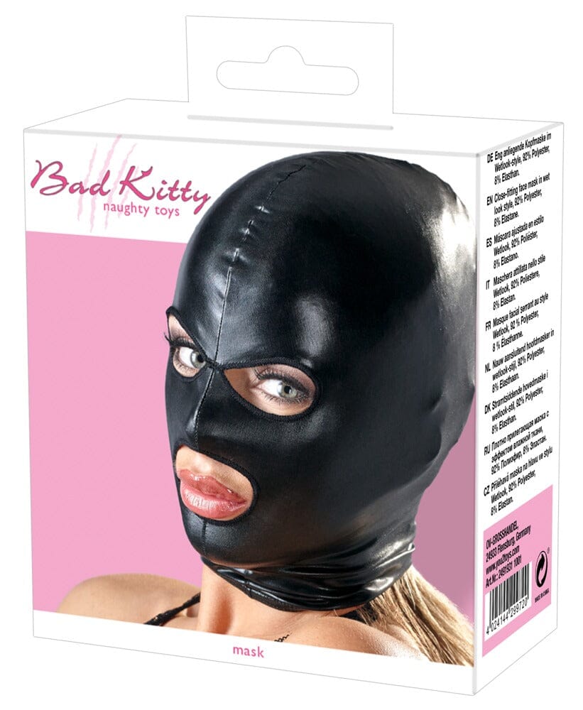 a woman wearing a black mask in a box