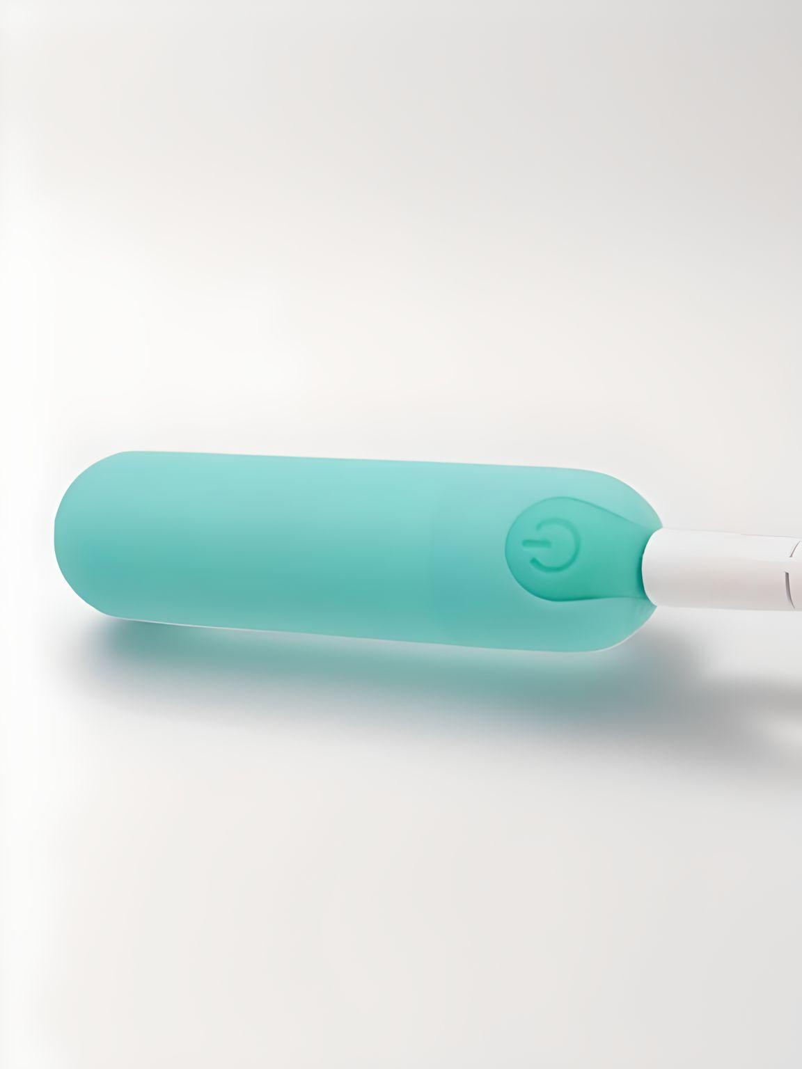 Close-up of Power Bullet Essential 3.5" - Teal, emphasizing the sleek silicone texture of the bullet vibrator's design.