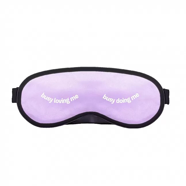 a sleeping mask with the words busy loving me on it