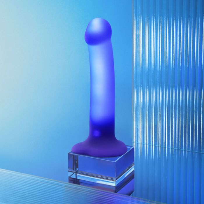 Strap On Me - Glow-LED Dildo Purple - M featuring a strong suction base and compatibility with harnesses for versatile play.