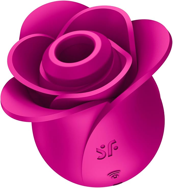 a pink rose shaped object on a white background