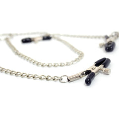 a black and silver chain with a pair of scissors on it
