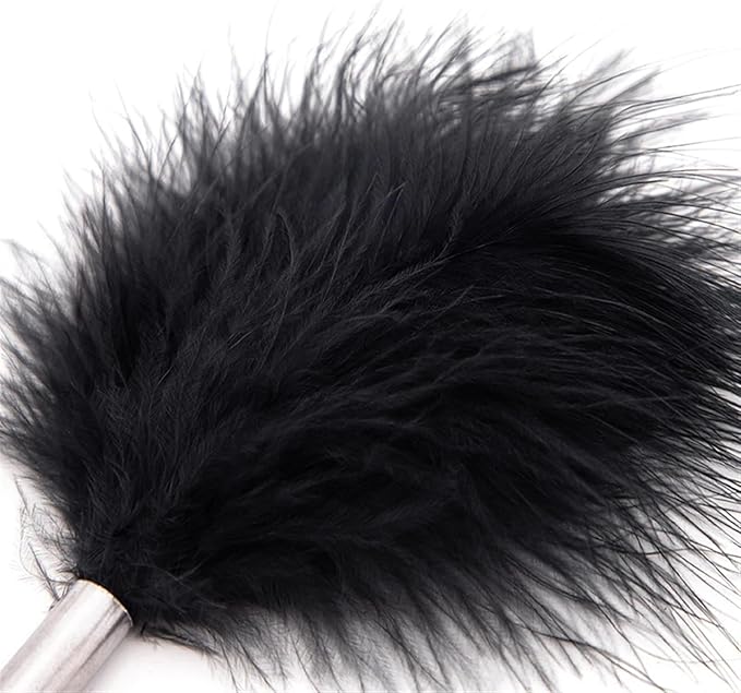 Luxurious feather tickler, featuring a soft black fur tip crafted for gentle teasing and heightened pleasure in BDSM play.