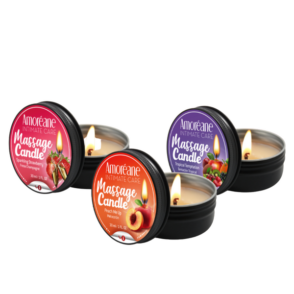 three tins of massage candles sitting next to each other