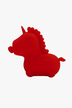 The alluring Unihorn - Cupid's Beau (The Heart Nosed One) resting delicately, epitomising a superior quality massaging vibrator crafted for intimate enjoyment.
