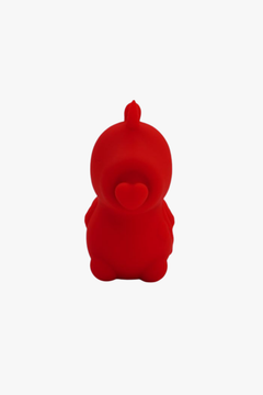 The delightful Unihorn - Cupid's Beau (The Heart Nosed One) displayed in an enchanting setting, highlighting its role as a sophisticated massaging vibrator.