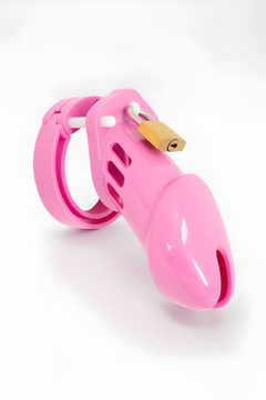 Aesthetic display of The Scandals Clear Black Pink and Blue Cock Cage, designed for luxurious BDSM experiences.