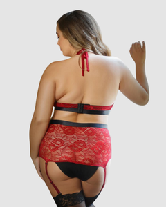 Dramatic shot of the Aria Crotchless Red Lace Plus Size Suspender Set, highlighting its seductive design and flattering fit, making it an essential piece in any luxurious suspender lingerie set.