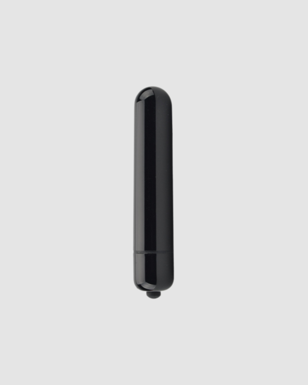 Loving Joy classic bullet vibrator in pink or black, compact design for powerful stimulation, shown in close-up with textured surface.