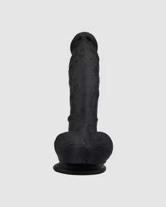 Loving Joy Realistic Silicone Dildo with Suction Cup and Balls captured in a luxurious lifestyle setting.
