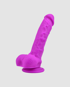Loving Joy Realistic Silicone Dildo with Suction Cup and Balls displayed in a chic and classy manner.