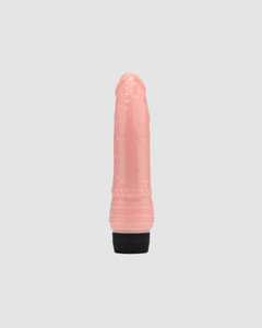 7 Inch Realistic Dildo Vibrator placed aesthetically beside luxury bath items, illustrating its waterproof capabilities for relaxing indulgences.