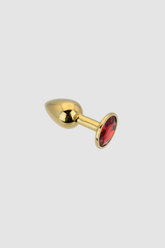 Shimmering Toosh Butt Plug With Gems highlighting the beauty of its jewelled base in an intimate ambience.