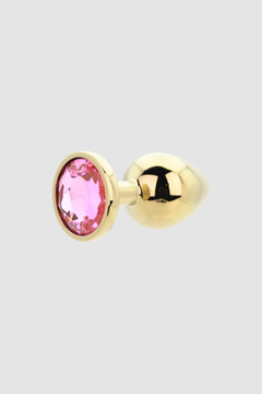 Toosh Butt Plug With Gems presented alongside various lubrication options, highlighting compatibility and versatility.