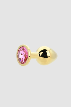 Intimate setting featuring the Toosh Butt Plug With Gems as part of a luxury collection.