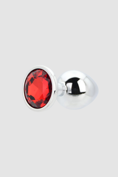 Toosh Butt Plug With Gems resting on a plush surface, showcasing its elegance and premium quality.