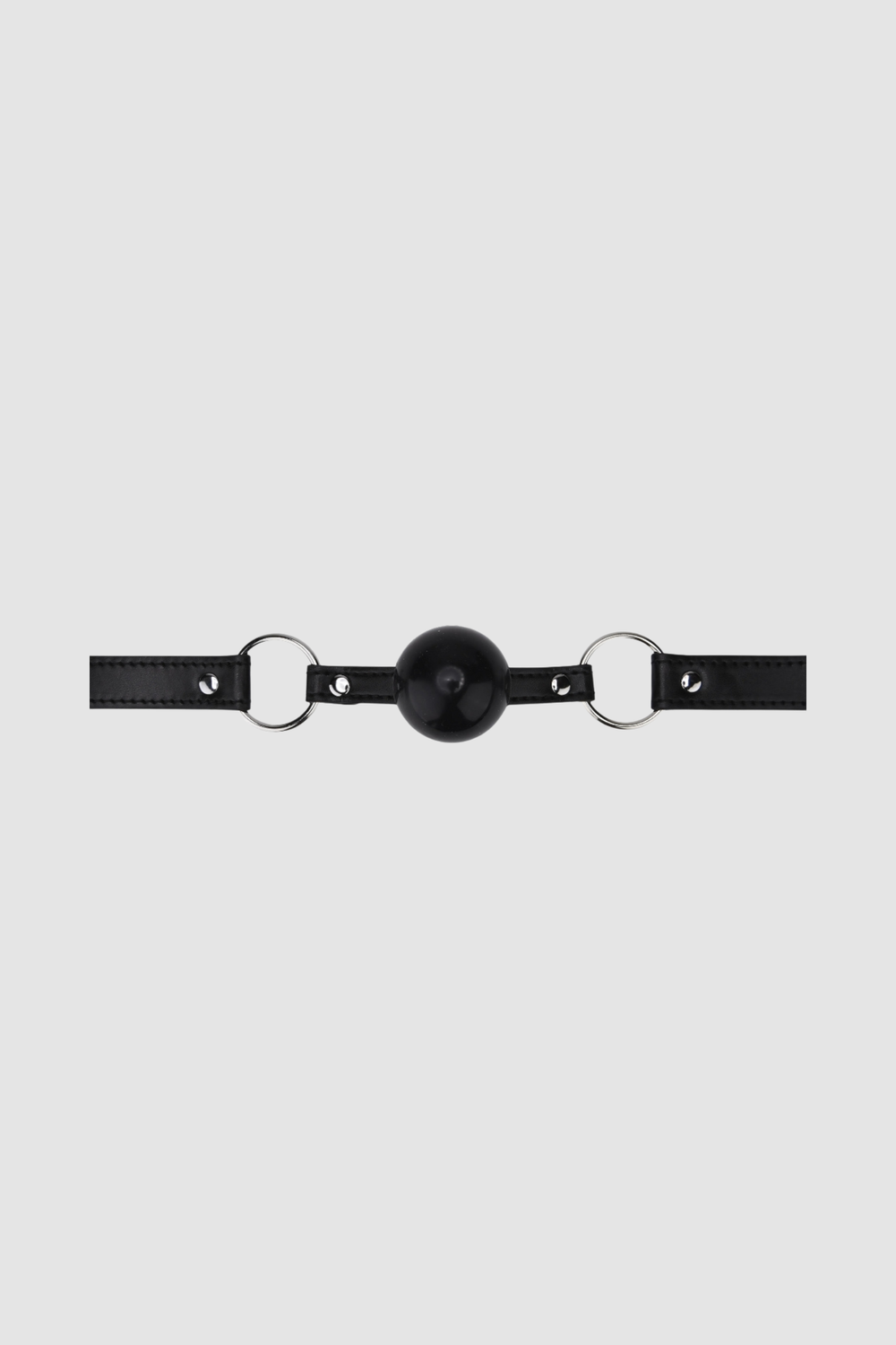 Loving Joy luxury silicone ball gag with adjustable faux leather straps, shown with ball bag in product photography.