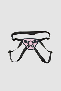 Luxurious Pink Universal Strap-On Harness with Adjustable Straps and 2 O-Rings for ultimate versatility and pleasure.