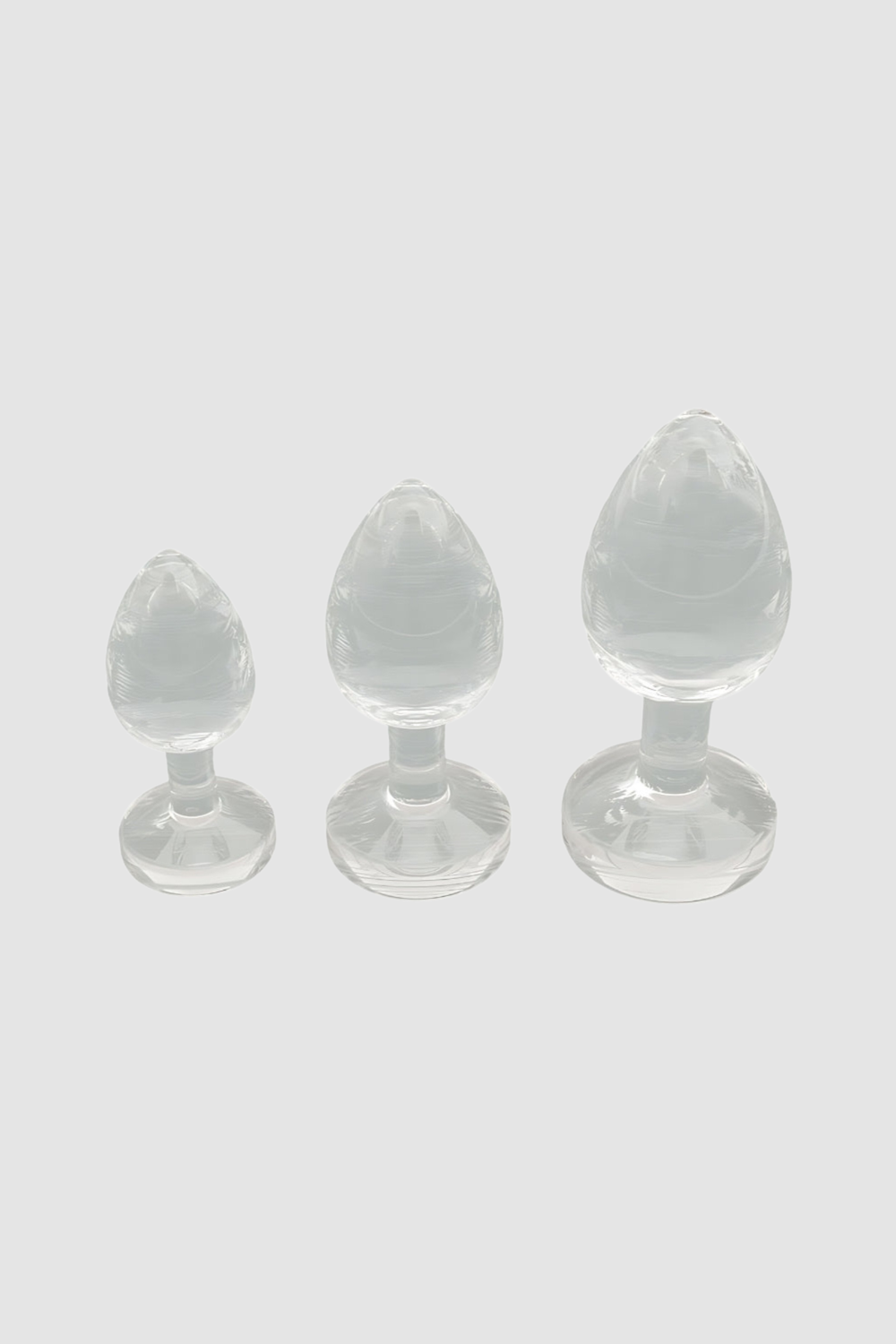 Loving Joy novelty silicone ice cube tray shaped like a butt plug with 3 sizes for fun, unique gift ideas, shown in the image.