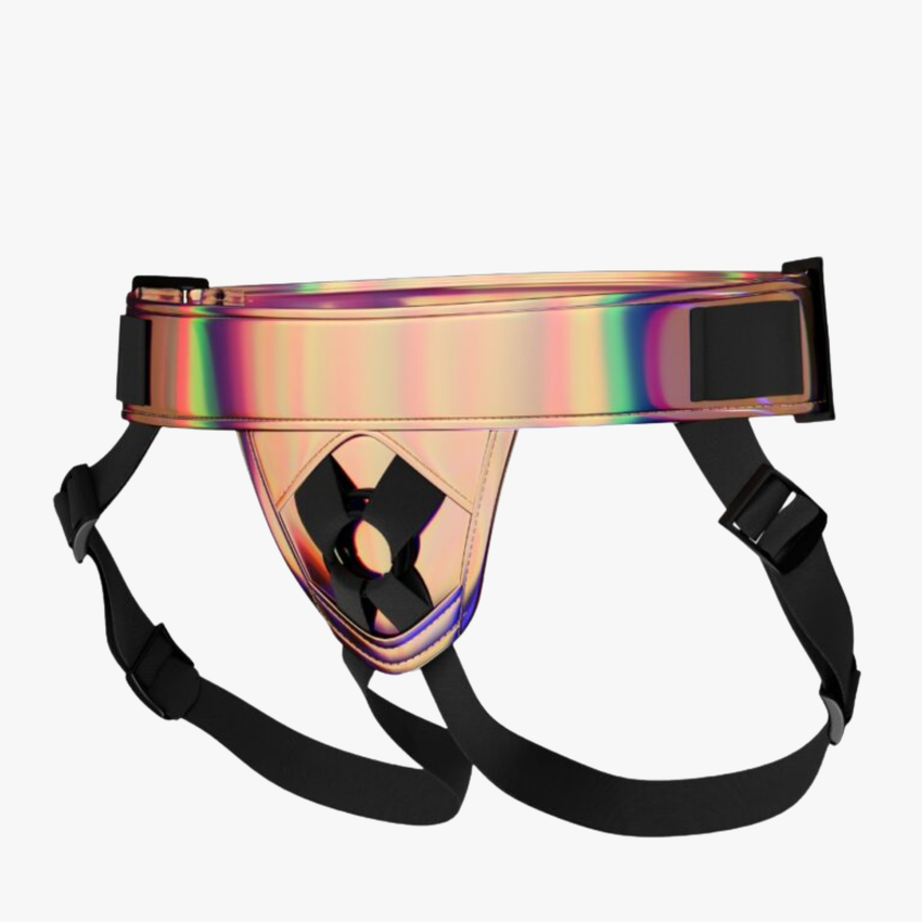 Shimmer Mina strap-on harness by 1on1 with adjustable straps and metallic finish, displayed on a plain background.