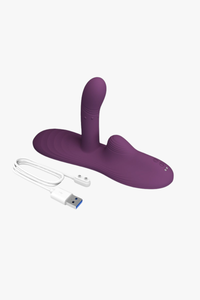 Purple silicone product with USB cable on a white background