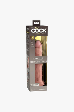 King Cock Elite 9 Inch Vibrating Silicone Dual Density Cock with Remote displayed against a lavish backdrop, epitomising luxury in a vibrating dildo.