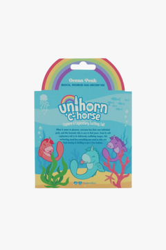 Unihorn C-Horse - Ocean Peak Dual Vibrator showcased in a lavish setup reflecting indulgent pleasure.