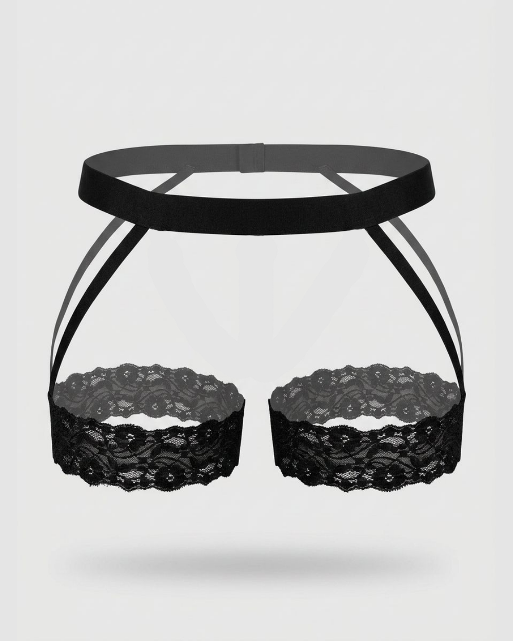 Black Male Power men's lace garter belt with attached garters, worn over men's briefs, stylish and revealing lingerie accessory.