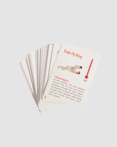 A couple playing "A Year Of Sex!" couples card game with colorful dice, promoting intimate fun and relationship connection.