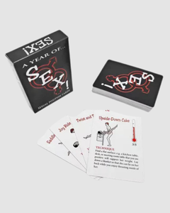 A set of dice and a card game called "A Year Of Sex" by 1on1, designed for couples to explore sexual positions together.