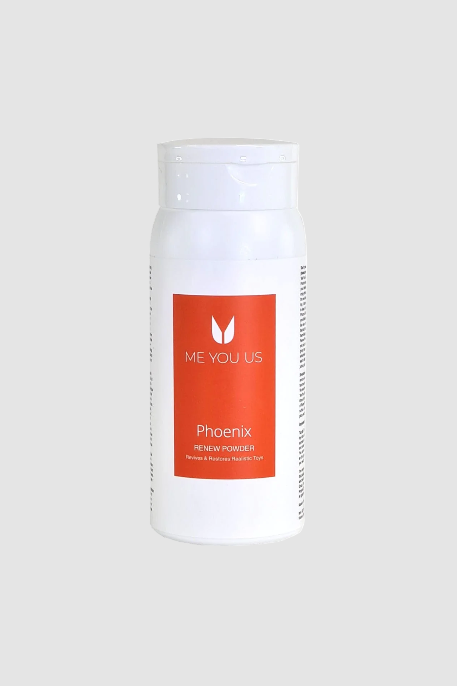Me You Us Phoenix Renew Powder cleaner for realistic feel toys, showing the powder container with labeling and product branding.