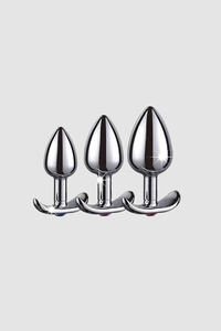 A luxurious weighted butt plug with a metal anchor base by Scandals, showcasing its sleek stainless steel design for an elegant experience.