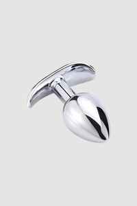 An elegant shot of the weighted butt plug with metal anchor base by Scandals, crafted for enhanced comfort and prolonged enjoyment during intimate play.