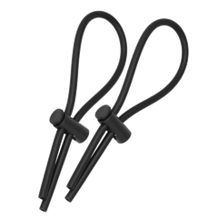 a pair of black ear buds on a black background