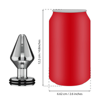 a red can next to a metal object