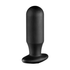 a black vibrating device on a white background