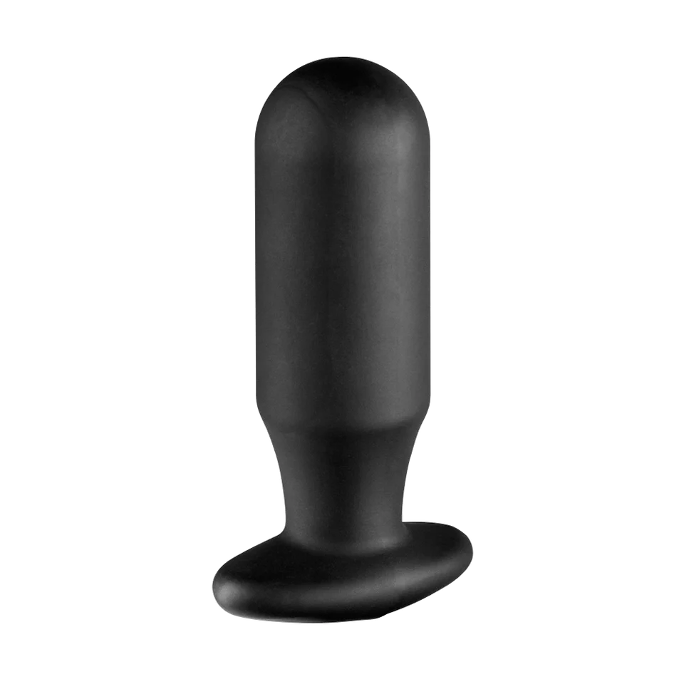 a black vibrating device on a white background