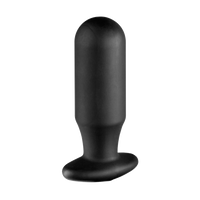 a black vibrating device on a white background