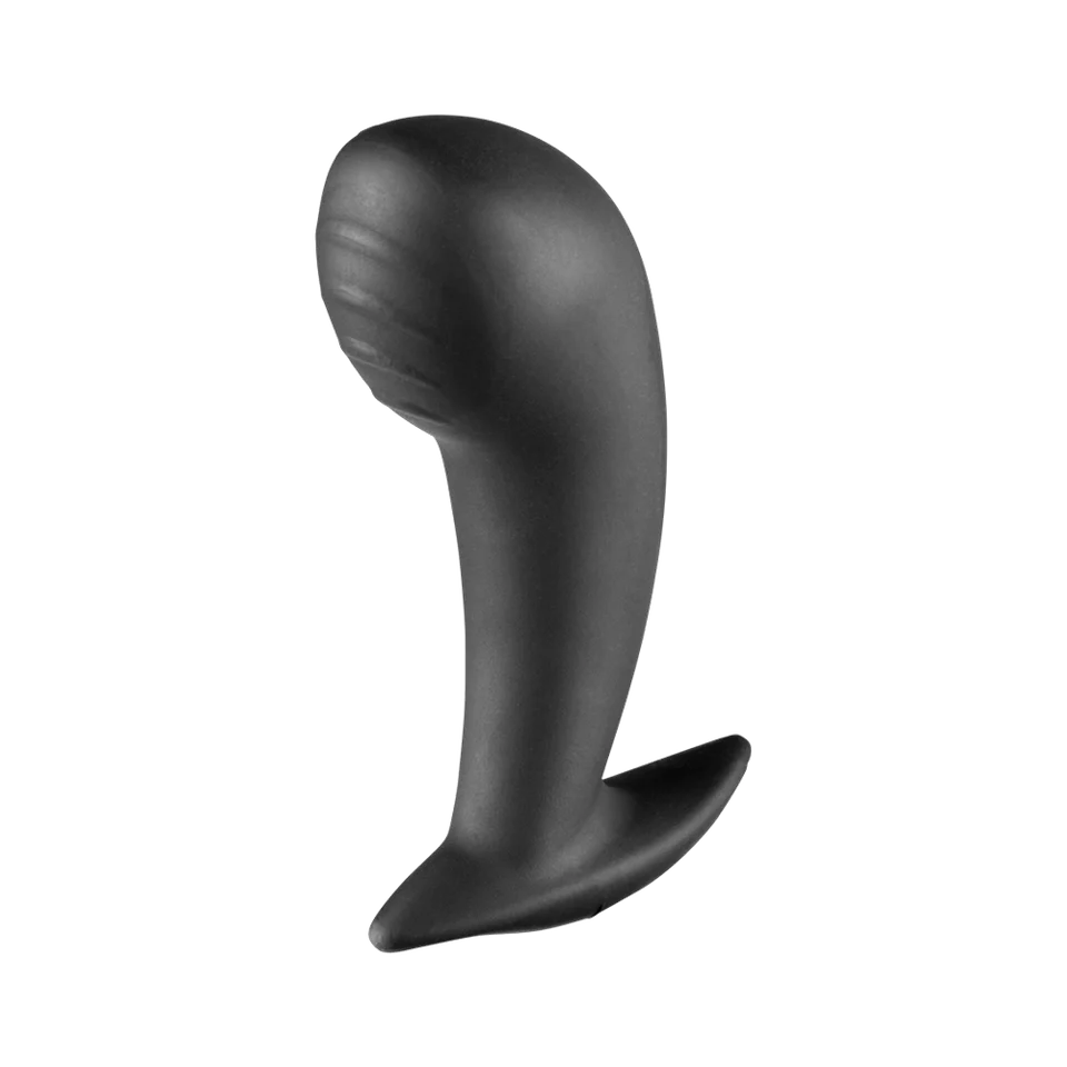 a black vibrating device on a black background