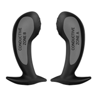 a pair of black and white vibrating devices