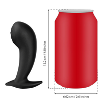 a red can and a black plastic object