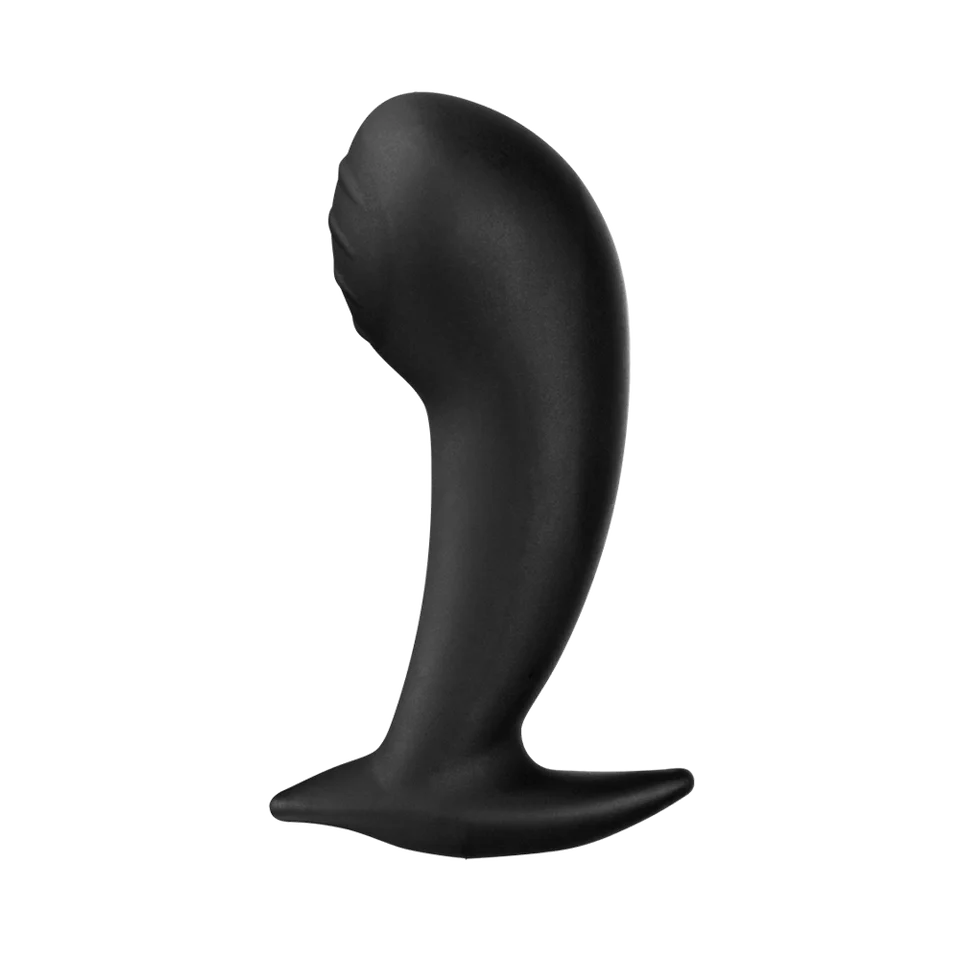 a black object with a long tail on a black background