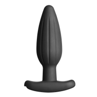 a black vibrating device on a black background