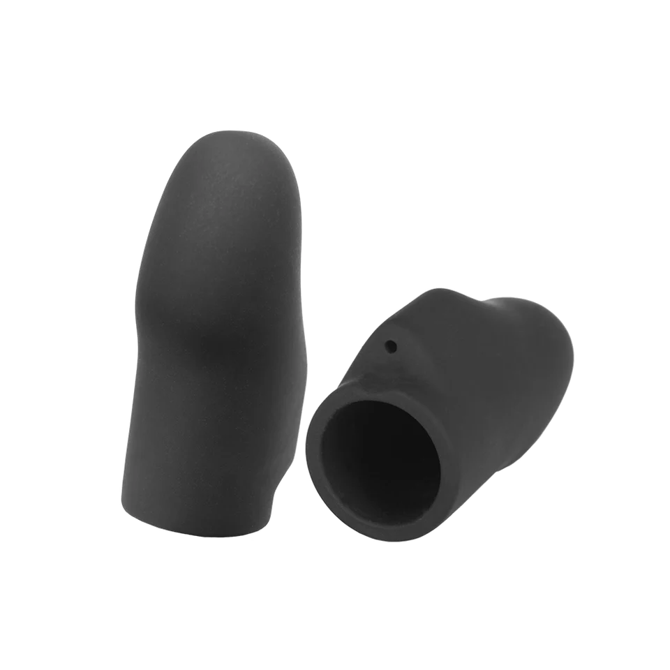 a pair of black rubber booties on a black background