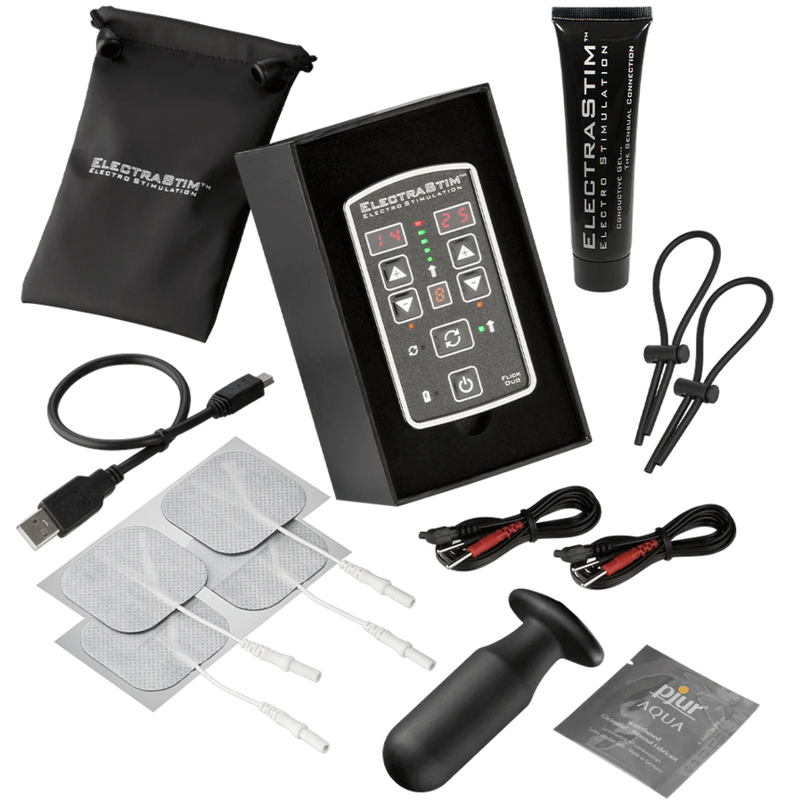 a black box with a pair of scissors and other items